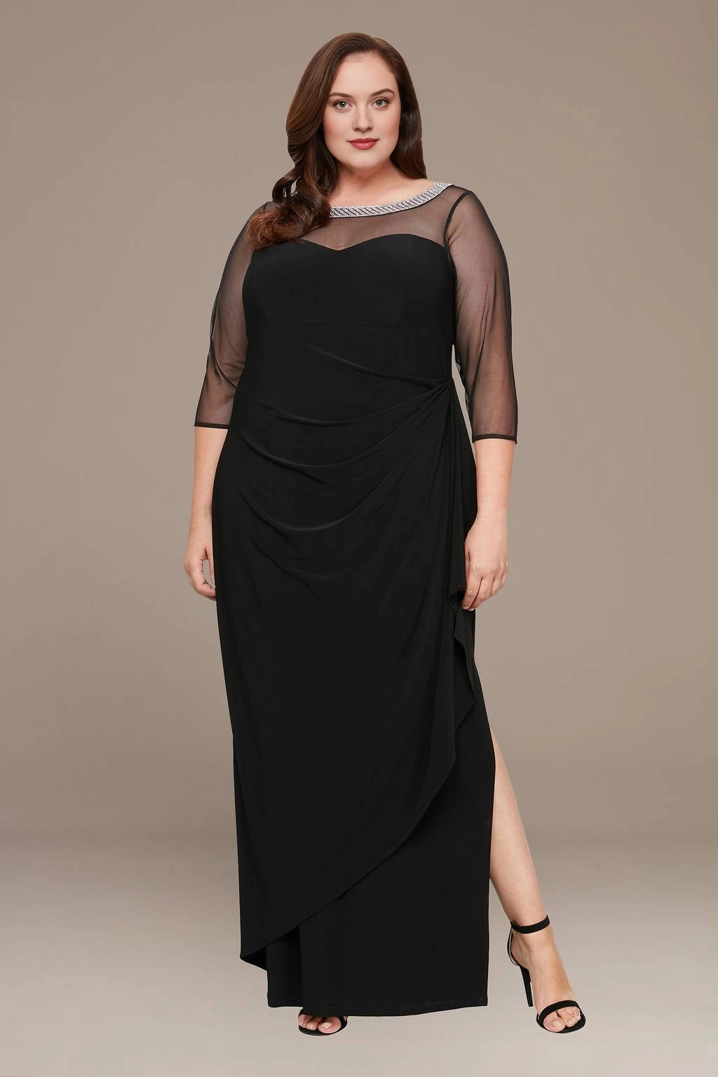 Black plus size mother of the bride dress with illusion neckline and sheer three-quarter sleeves