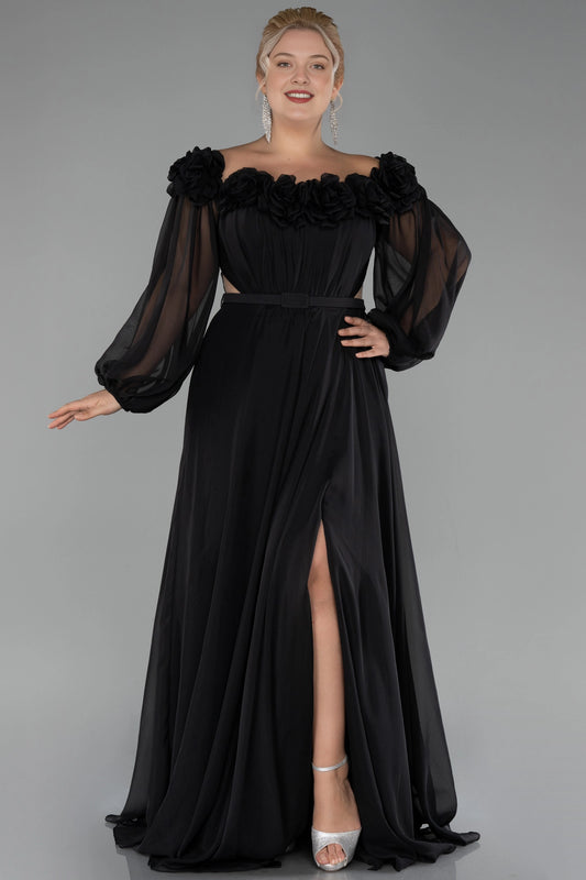 Black plus size A-line wedding guest dress with sheer long sleeves and floral details