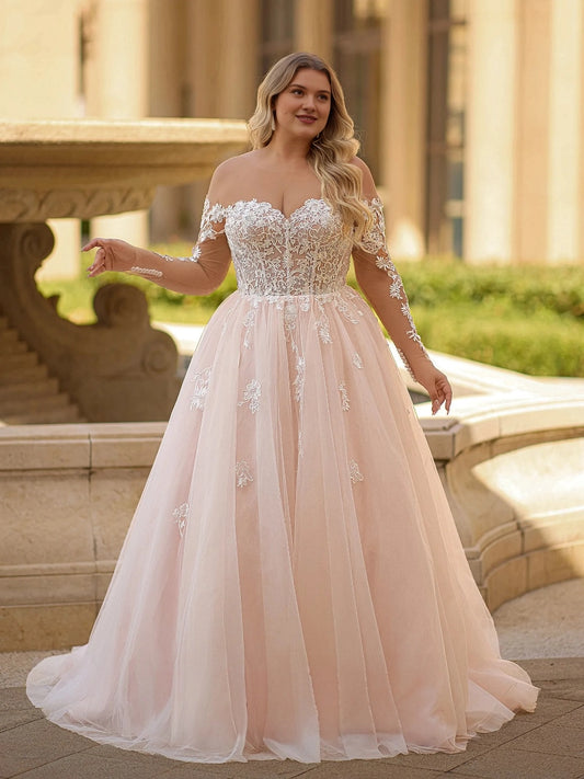 Blush pink plus size A-line wedding dress with sweetheart neckline, off-shoulder lace long sleeves, floral corset bodice and tulle skirt