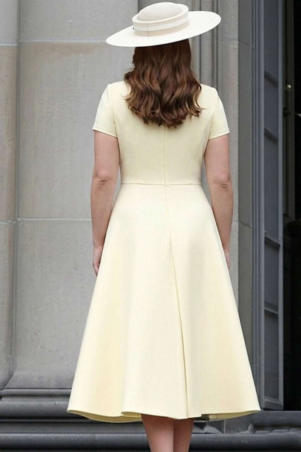 Back view of ivory plus size mother of the bride midi dress featuring a closed back, defined waist and flowing A-line skirt.