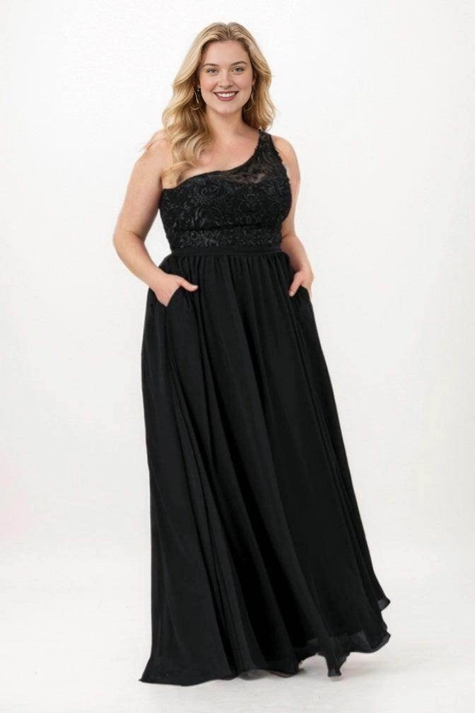 Roselledress black plus size bridesmaid dress with a one-shoulder lace bodice, floor-length chiffon A-line skirt and side pockets, front view.