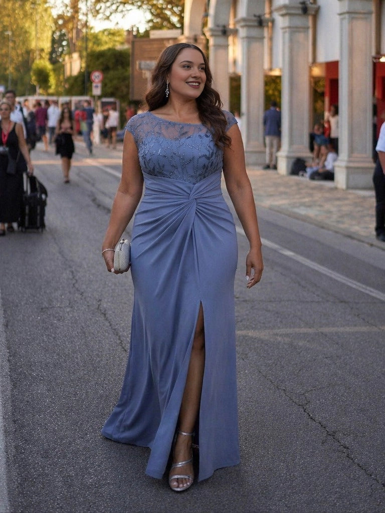 Dusty blue plus size mother of the bride dress with embroidered bateau neckline, cap sleeves, ruched waist and front slit