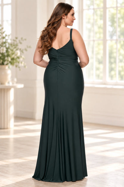 Back view of a dark green fitted wedding guest dress with a shallow V-back, center zipper, ruched hips and gently flared hem.