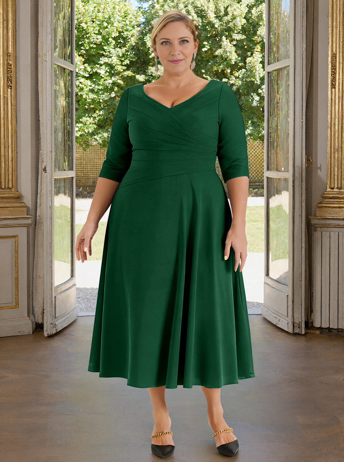 Emerald green plus size mother of the bride dress with V-neck and three-quarter sleeves