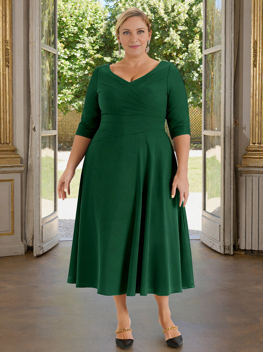 Emerald green plus size mother of the bride dress with V-neck and three-quarter sleeves