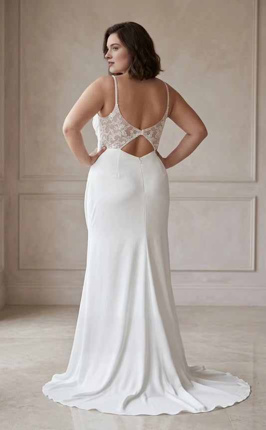 Ivory plus size wedding dress with sheer floral lace back, diamond-shaped cutout, zipper closure and soft sweep train