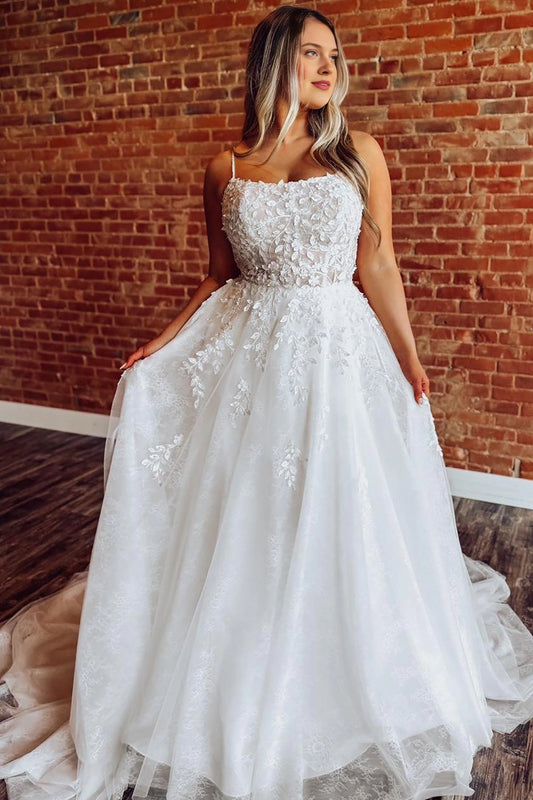 Ivory plus size A-line wedding dress with sweetheart neckline, spaghetti straps, floral lace bodice and flowing tulle skirt