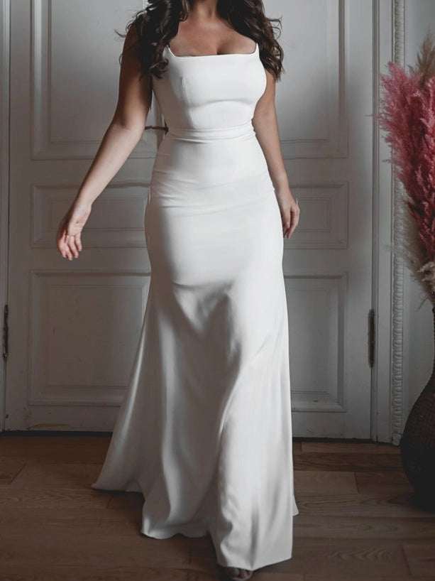 Minimalist white mermaid wedding dress with square neckline, off shoulder straps and fitted silhouette by roselledress.