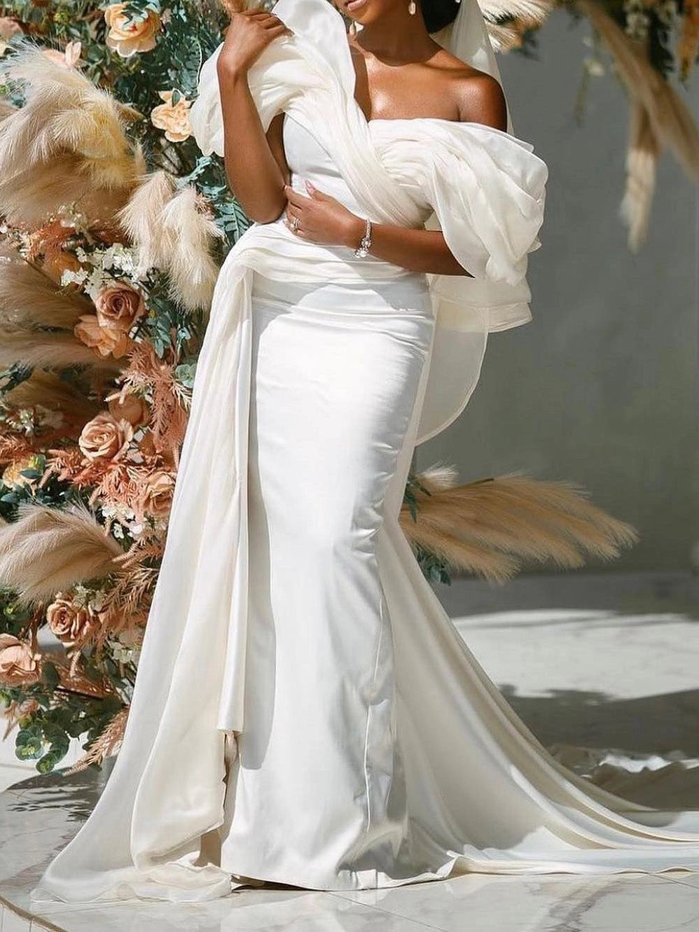 Elegant off shoulder mermaid wedding dress with long sleeves, fitted silhouette and chapel train by roselledress.