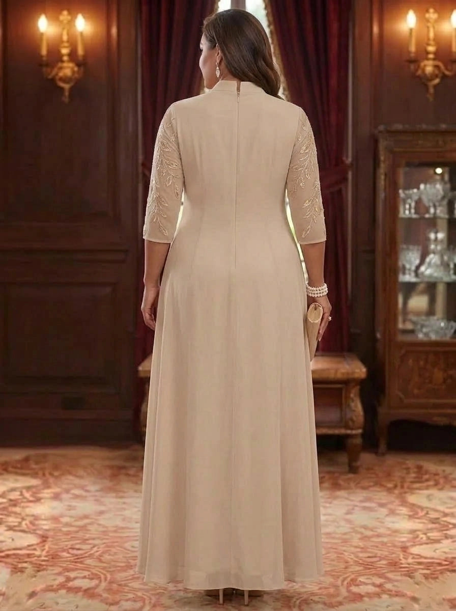 Back view of plus size champagne mother of the bride dress featuring embellished sleeves, high back neckline and center zipper closure.