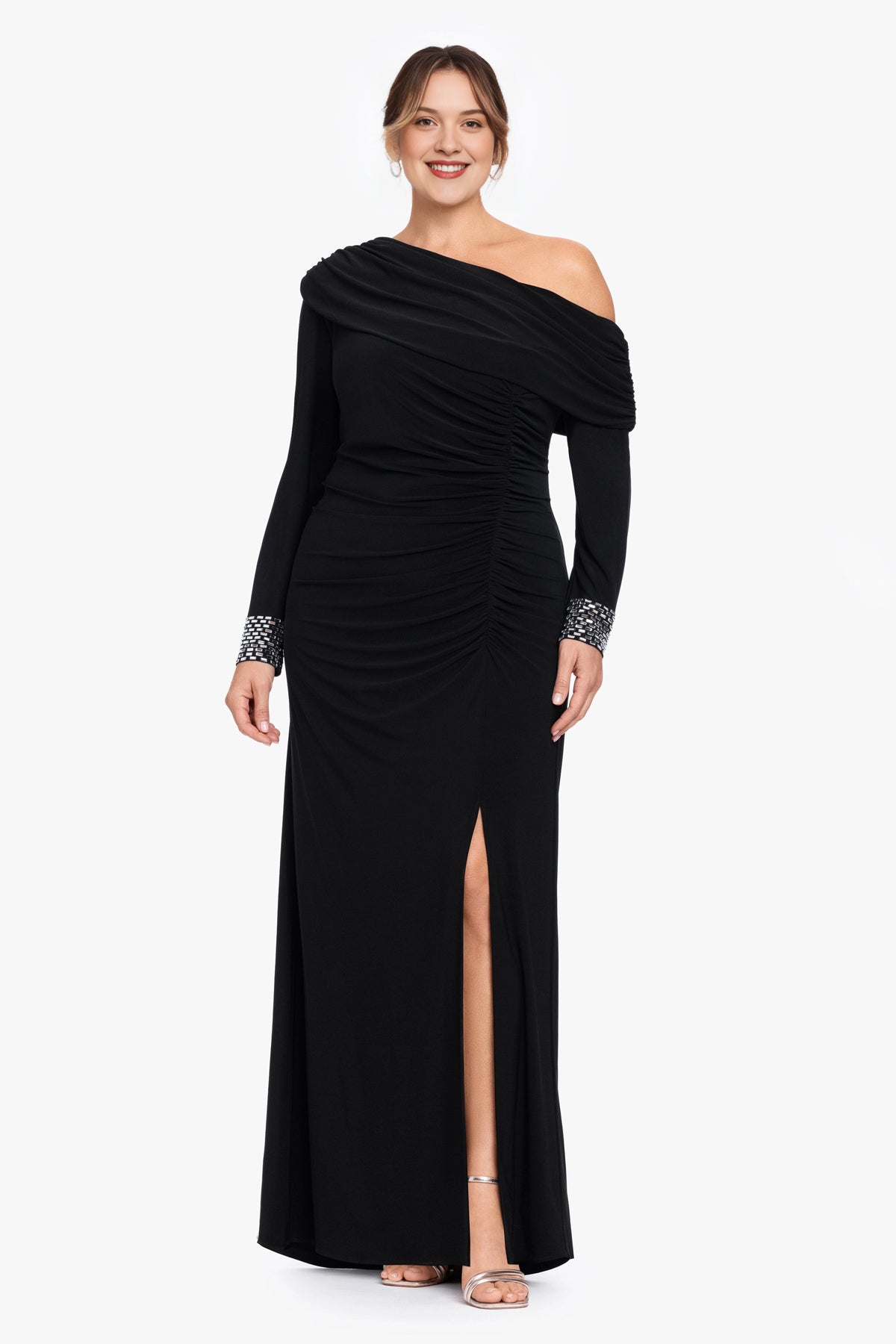 Black plus size wedding guest dress with asymmetric off shoulder neckline, long sleeves, beaded cuffs, ruched waist and front slit by roselledress