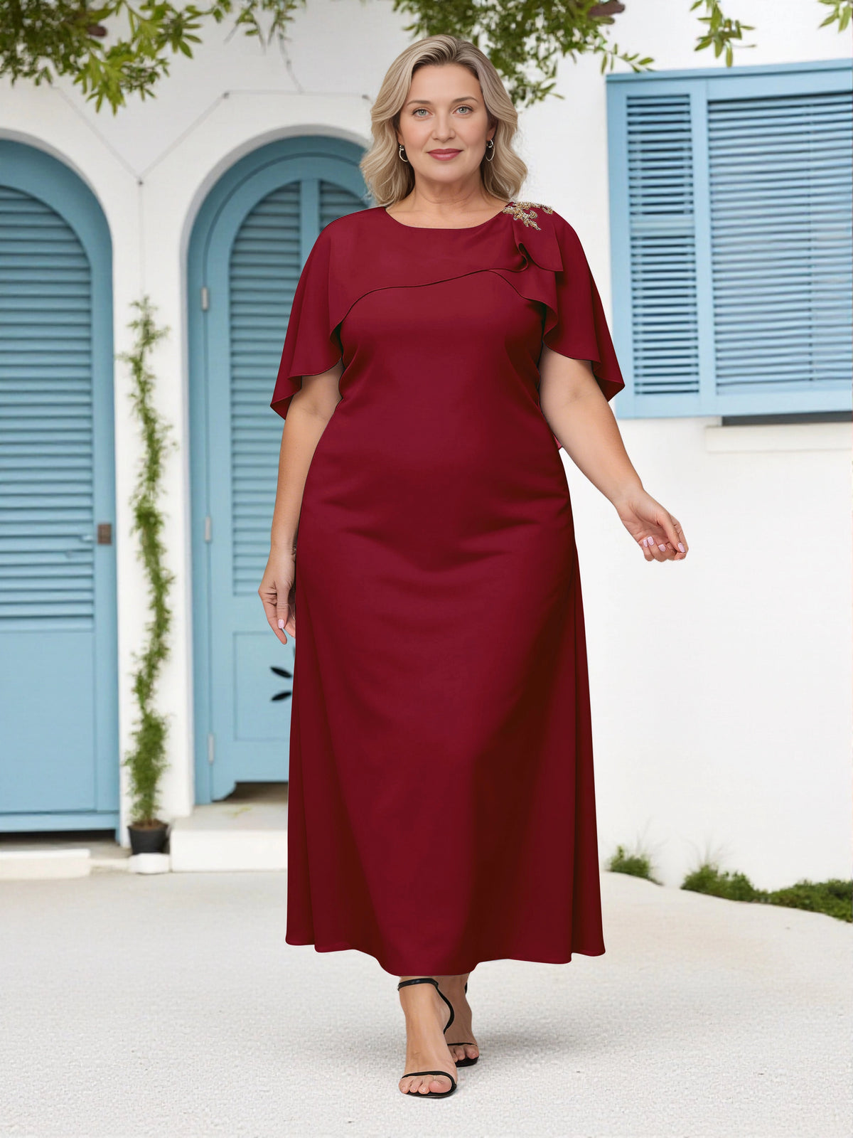 Burgundy plus size mother of the bride dress with round neckline, flowing cape sleeves, beaded shoulder detail and elegant maxi skirt by roselledress