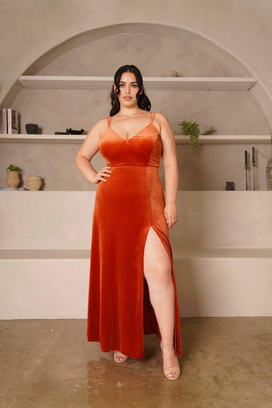 Plus size burnt orange velvet-look evening dress with V-neckline, double spaghetti straps, defined waist and flowing floor-length A-line skirt by roselledress.