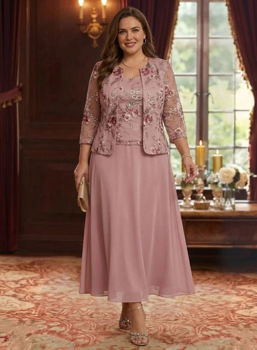 Plus size dusty pink mother of the bride dress with embroidered jacket, floral embellishments, three quarter sleeves and A-line midi skirt by roselledress.
