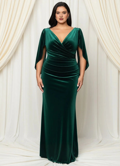 Plus size emerald green velvet mother of the bride dress with V-neck wrap bodice, cape sleeves, ruched waist and mermaid floor length skirt, front view
