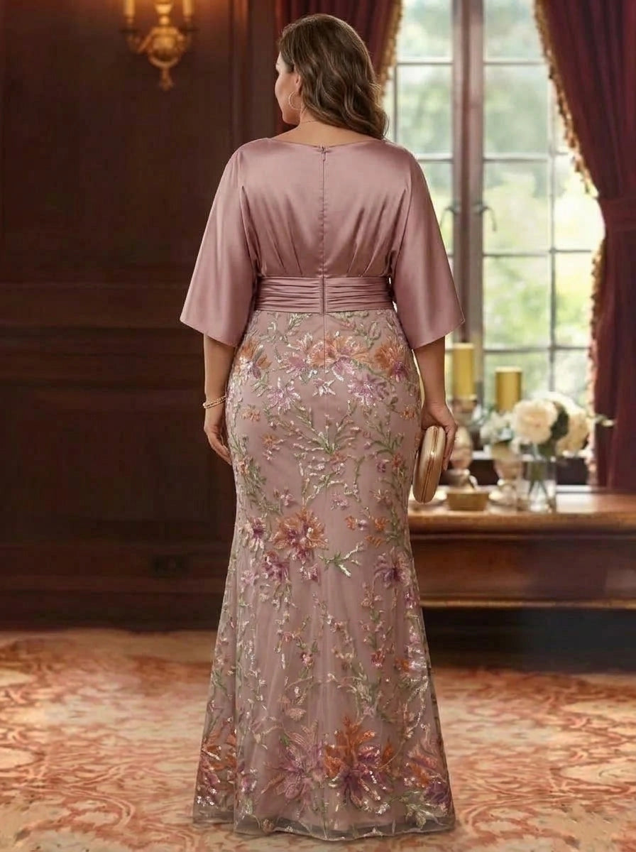 Back view of plus size dusty pink mother of the bride dress featuring floral embroidery, flutter sleeves and center zipper closure.