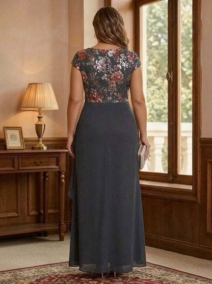 Back view of plus size navy mother of the bride dress featuring floral lace back, short sleeves and center zipper closure.