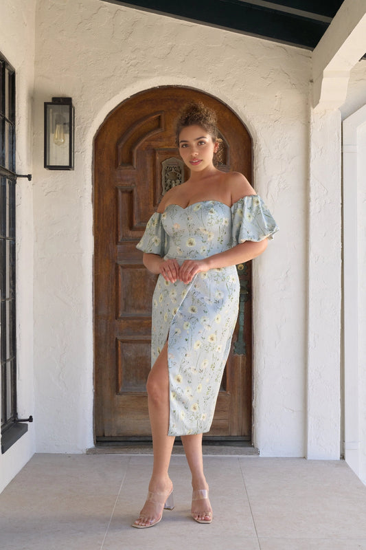 Light blue floral plus size wedding guest dress with sweetheart neckline, off shoulder puff sleeves, front slit and fitted midi skirt by roselledress