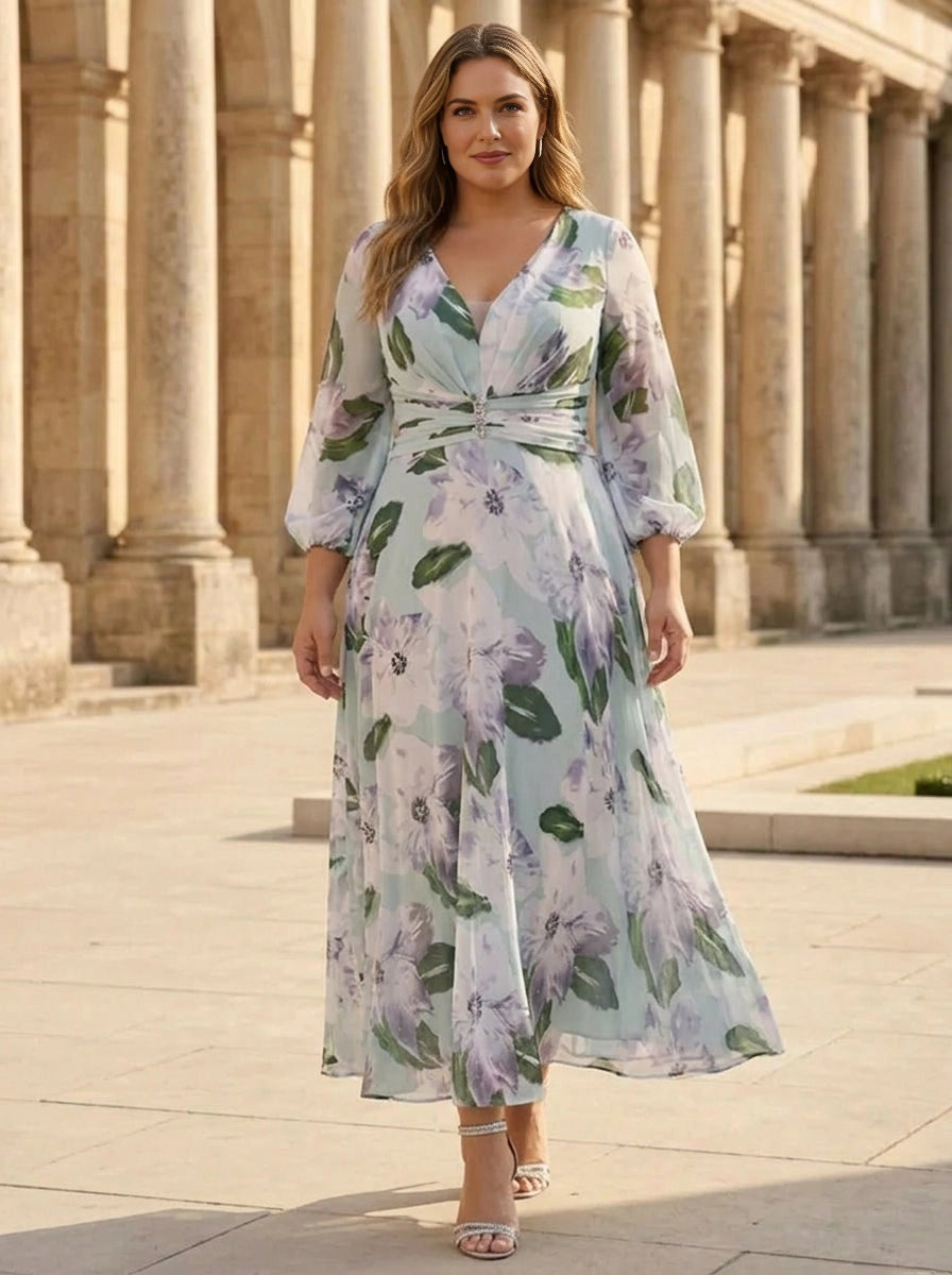 Plus size floral print wedding guest dress with V neckline, puff sleeves, pleated waist and flowing A-line skirt by roselledress.