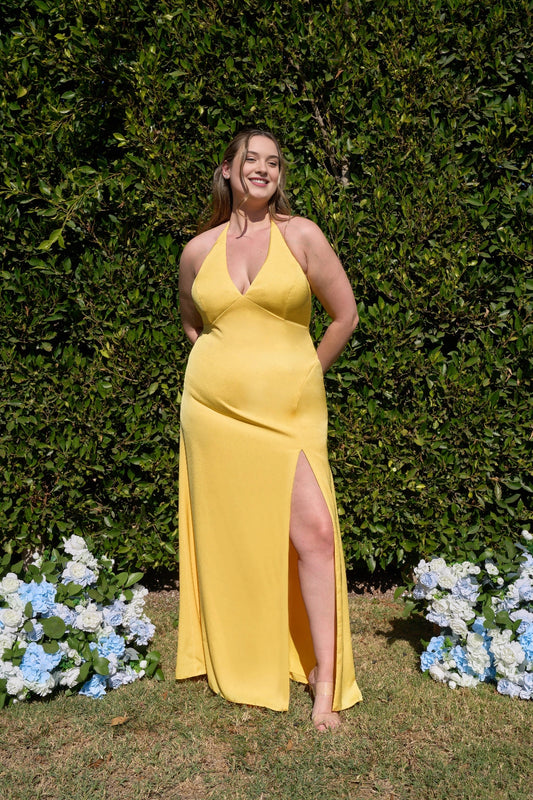 Plus size sunshine yellow bridesmaid dress with plunging V-neckline, halter straps, fitted waist, high slit and flowing floor-length skirt by roselledress.