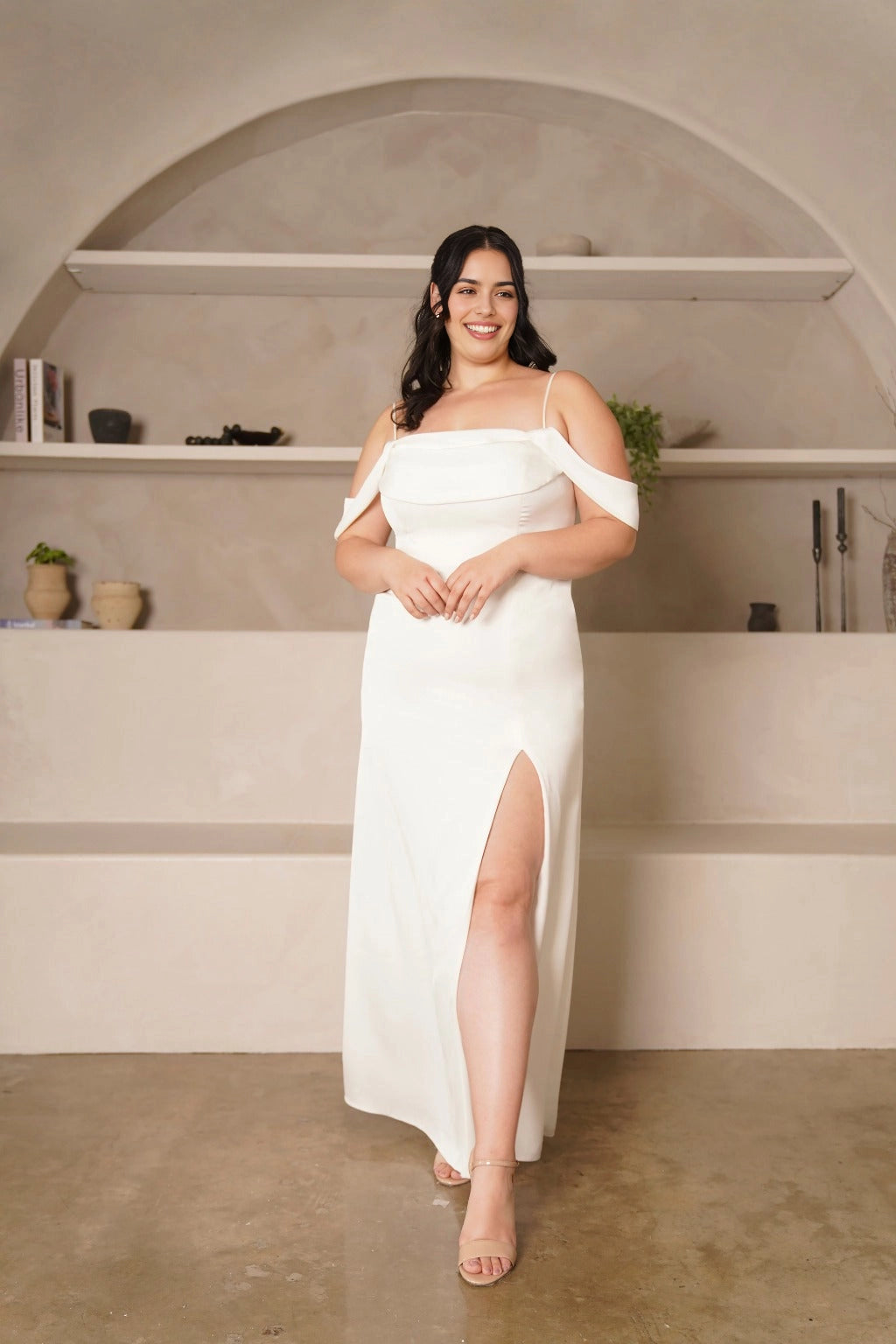 Plus size ivory wedding guest dress with straight neckline, spaghetti straps, off-shoulder sleeves, fitted mermaid silhouette and elegant front slit by roselledress.