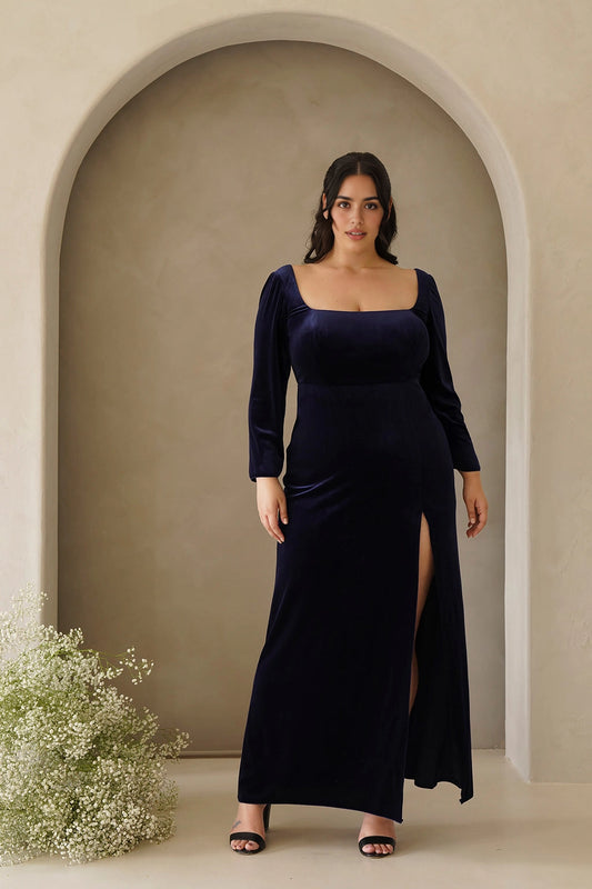 Navy blue plus size velvet evening dress with square neckline, long sleeves, fitted waist and high side slit by roselledress