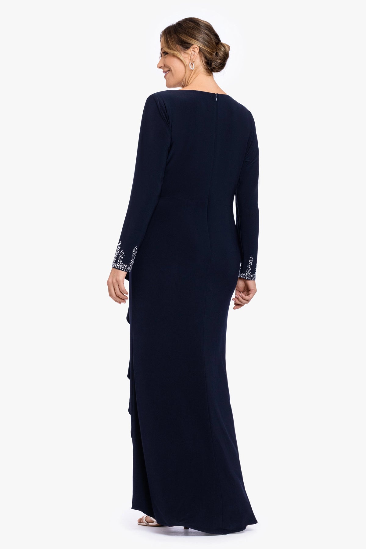 Back view of navy blue plus size mother of the bride dress with closed neckline, center back zipper, long sleeves and floor-length skirt by roselledress