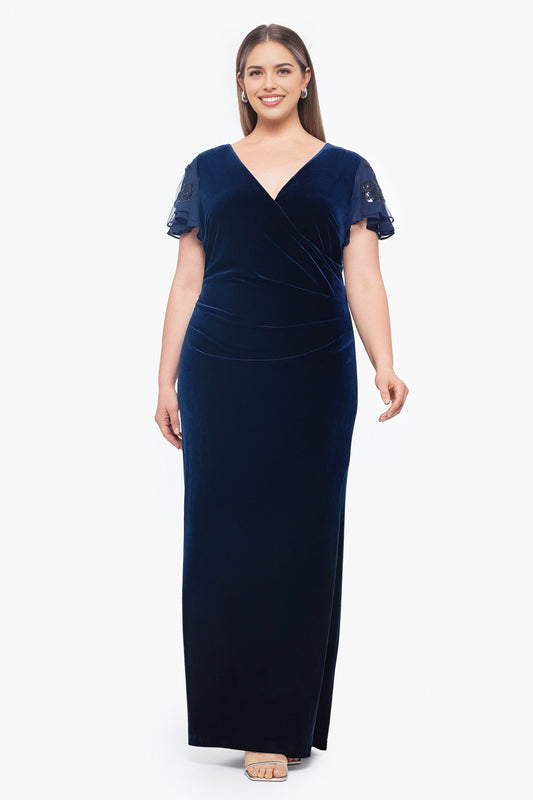 Navy blue plus size velvet mother of the bride dress with V-neckline, sequin flutter sleeves, ruched waist and floor-length sheath skirt by roselledress