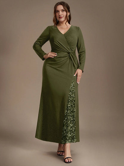 Plus size olive green glitter wedding guest dress with V-neck, long sleeves, twisted waist, front high slit with sequin panel and mermaid floor length skirt, front view

