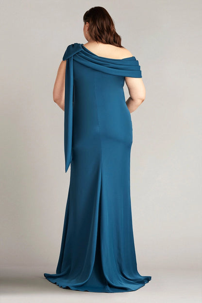 Back view of teal blue plus size wedding guest dress with draped asymmetric neckline, flowing shoulder sash and mermaid silhouette by roselledress