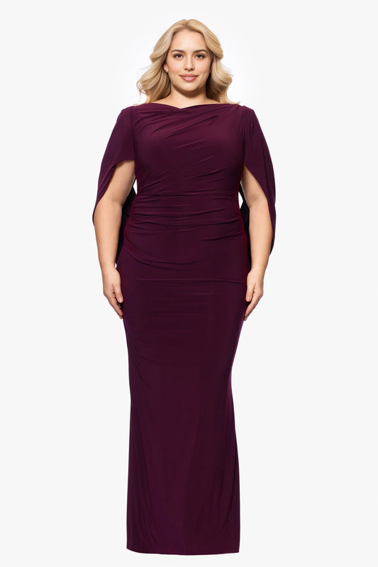 Plum purple plus size wedding guest dress with boat neckline, ruched bodice, cape sleeves and floor-length sheath silhouette by roselledress