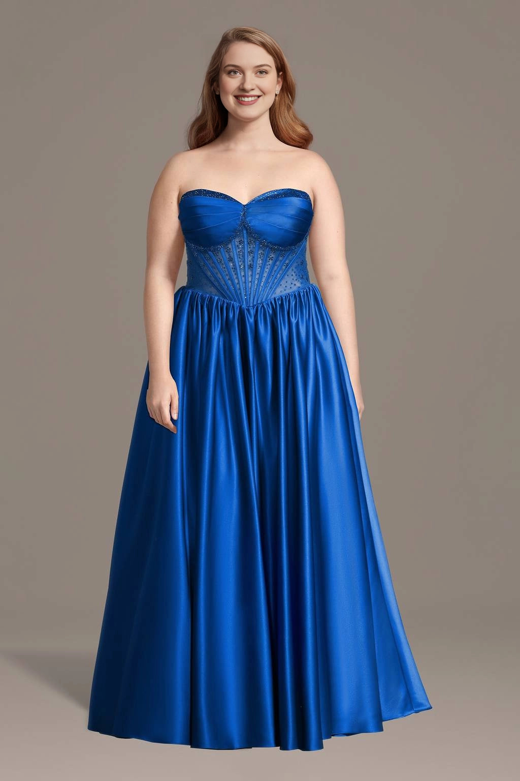 Plus size royal blue evening dress with sweetheart neckline, strapless embellished bodice and flowing A-line skirt by roselledress.