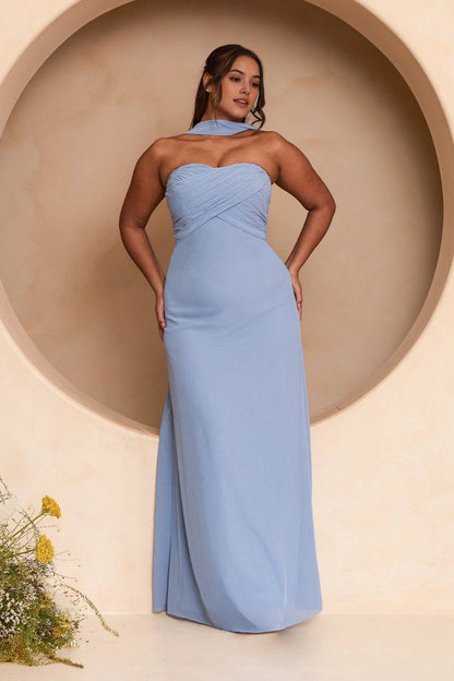 Plus size dusty blue bridesmaid dress with sweetheart neckline, crisscross ruched bodice, draped neck scarf and elegant floor-length sheath silhouette.