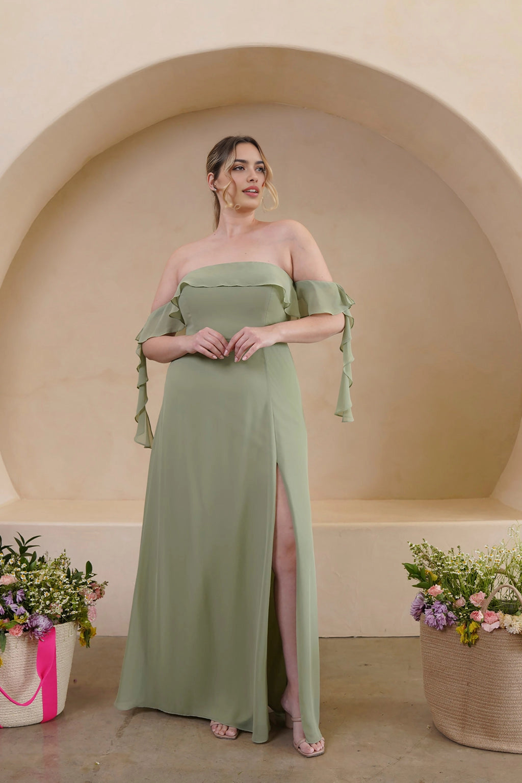 Sage green plus size A-line bridesmaid dress with off shoulder ruffle sleeves, straight neckline and thigh high slit by roselledress