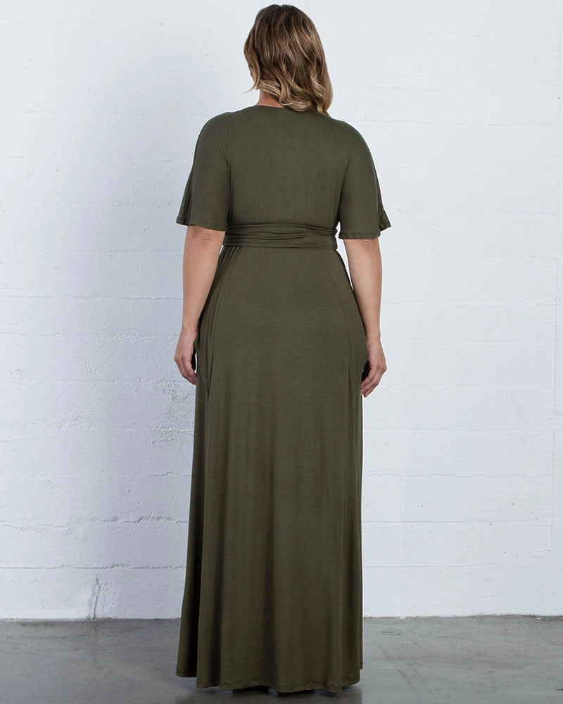 Back view of plus size dark olive green mother of the bride dress featuring a high closed back, short flutter sleeves, wide waistband and flowing maxi skirt by roselledress.