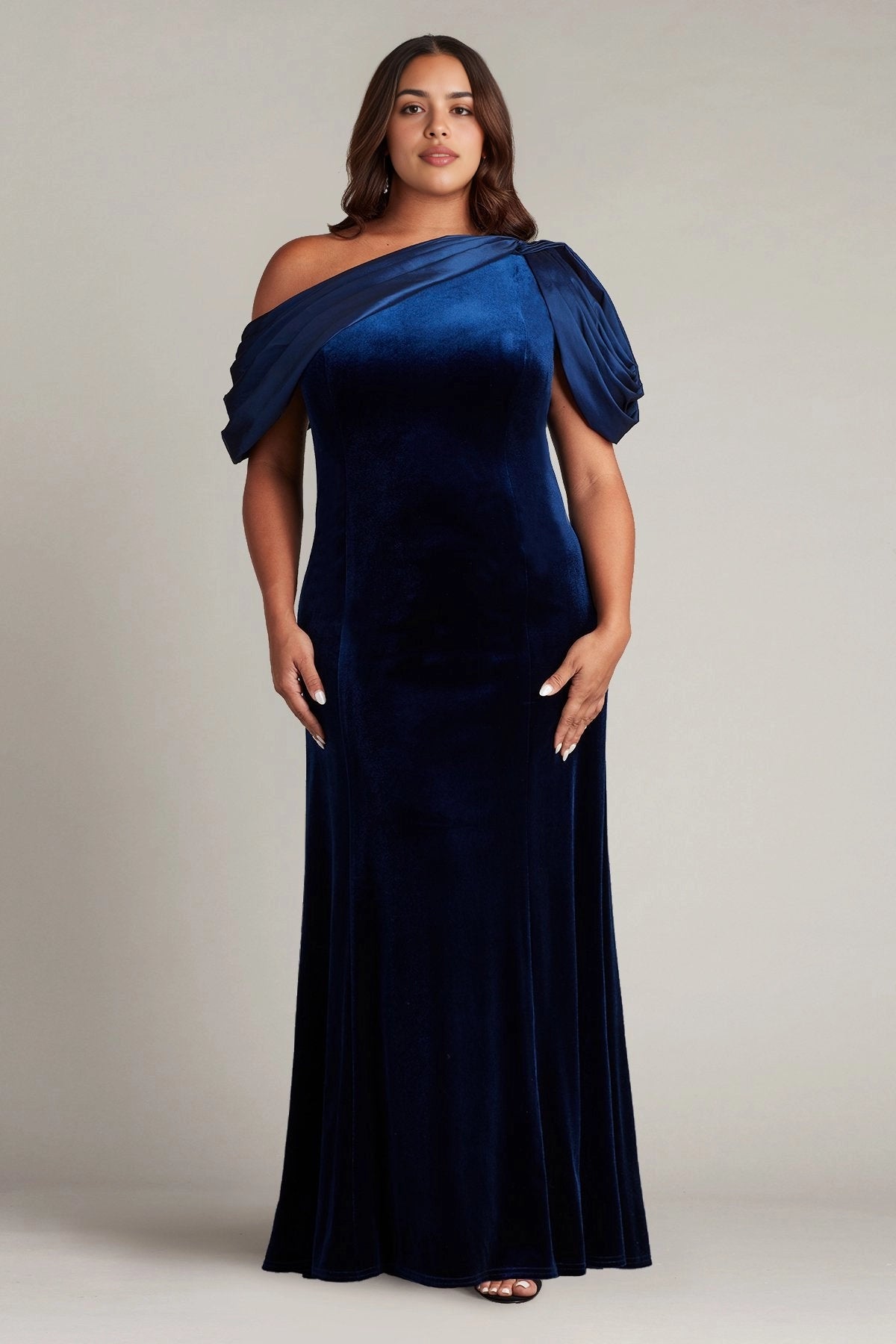 Royal blue plus size velvet wedding guest dress with asymmetric neckline, draped shoulder sleeves and floor-length sheath silhouette by roselledress