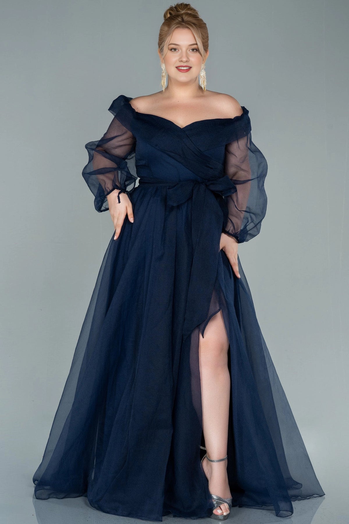 Front view of a roselledress plus size navy blue off shoulder A-line evening dress with sheer puff sleeves