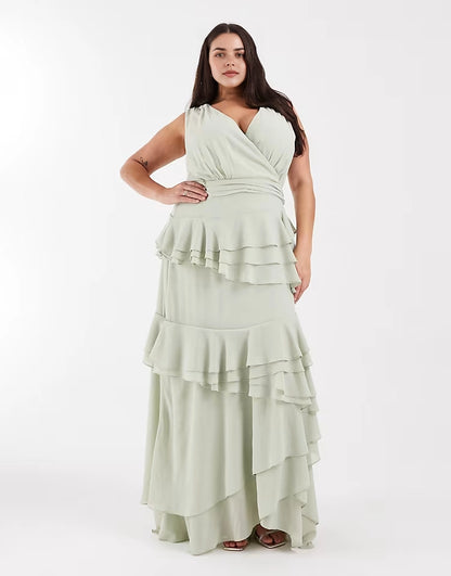 Roselledress plus size sage green chiffon tiered wrap v‑neck sleeveless maxi wedding guest dress front view on curvy model