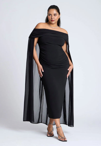 Roselle Dress plus size black off‑the‑shoulder ruched midi wedding guest dress with flowing mesh cape sleeves front view