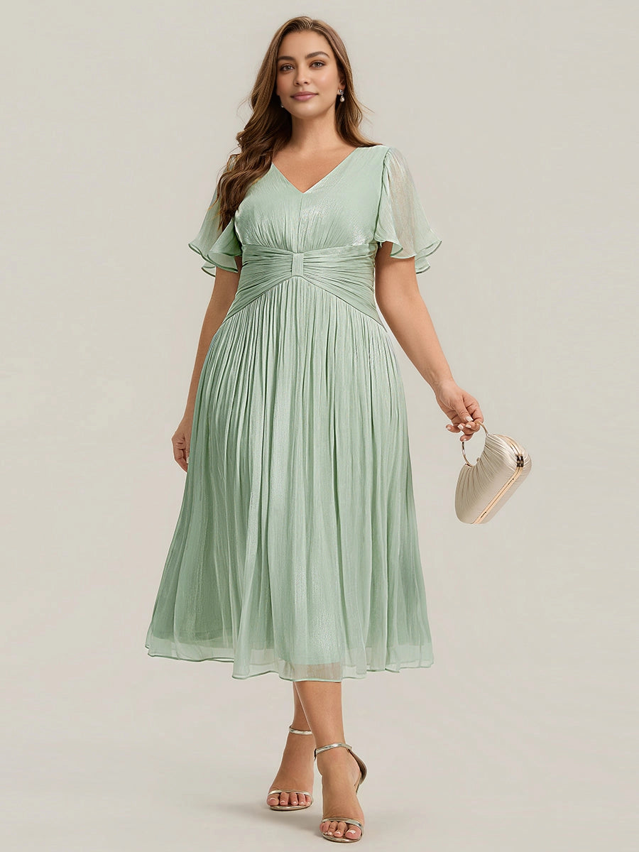 Roselle Dress plus size sage green wedding guest dress, v‑neck flutter short sleeve, pleated chiffon midi gown front view